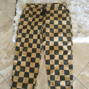 Lazy Oaf Black and Gold Smiley Check Pants